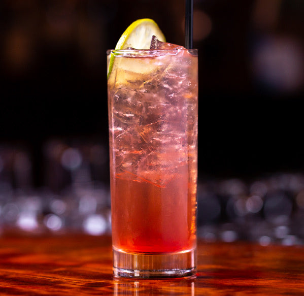 the Classic Daisy cocktail, made with gin, bourbon, or applejack, lemon juice, and grenadine