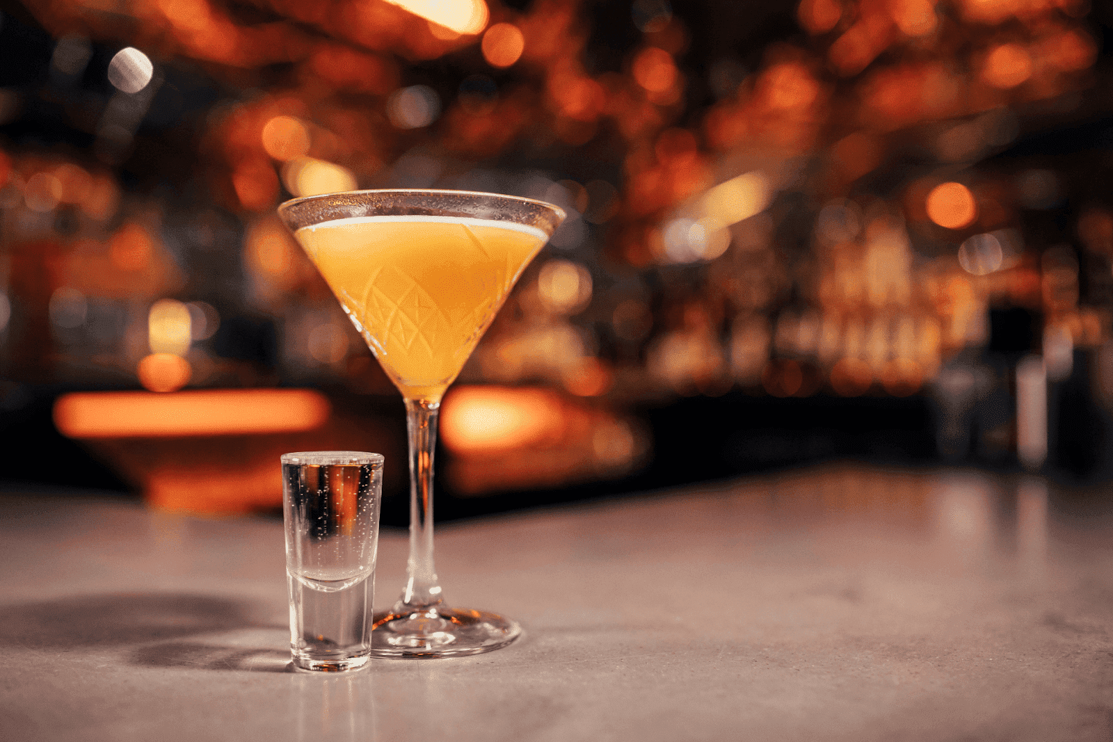 Pornstar martini served in a cocktail glass with a side shot of prosecco