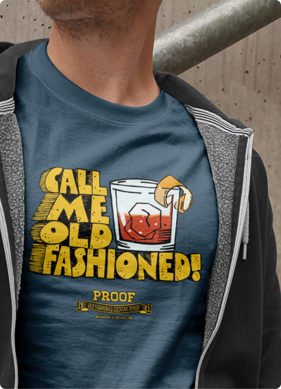 A t-shirt that reads, "Call Me Old Fashioned!" with an illustration of a cocktail.