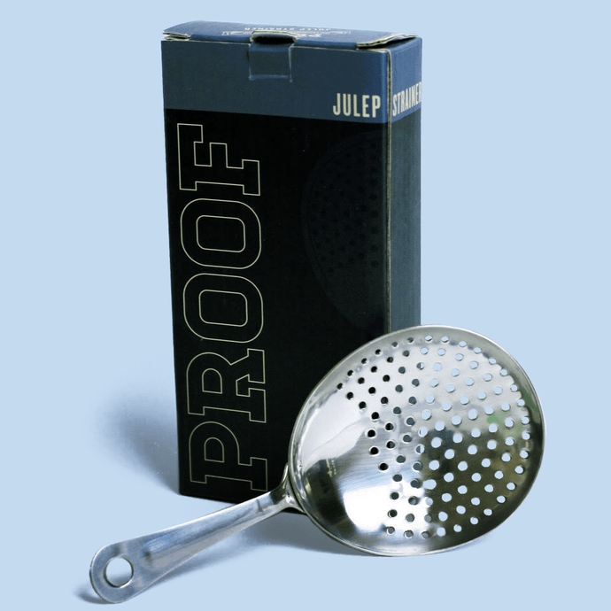 A julep strainer and its box.
